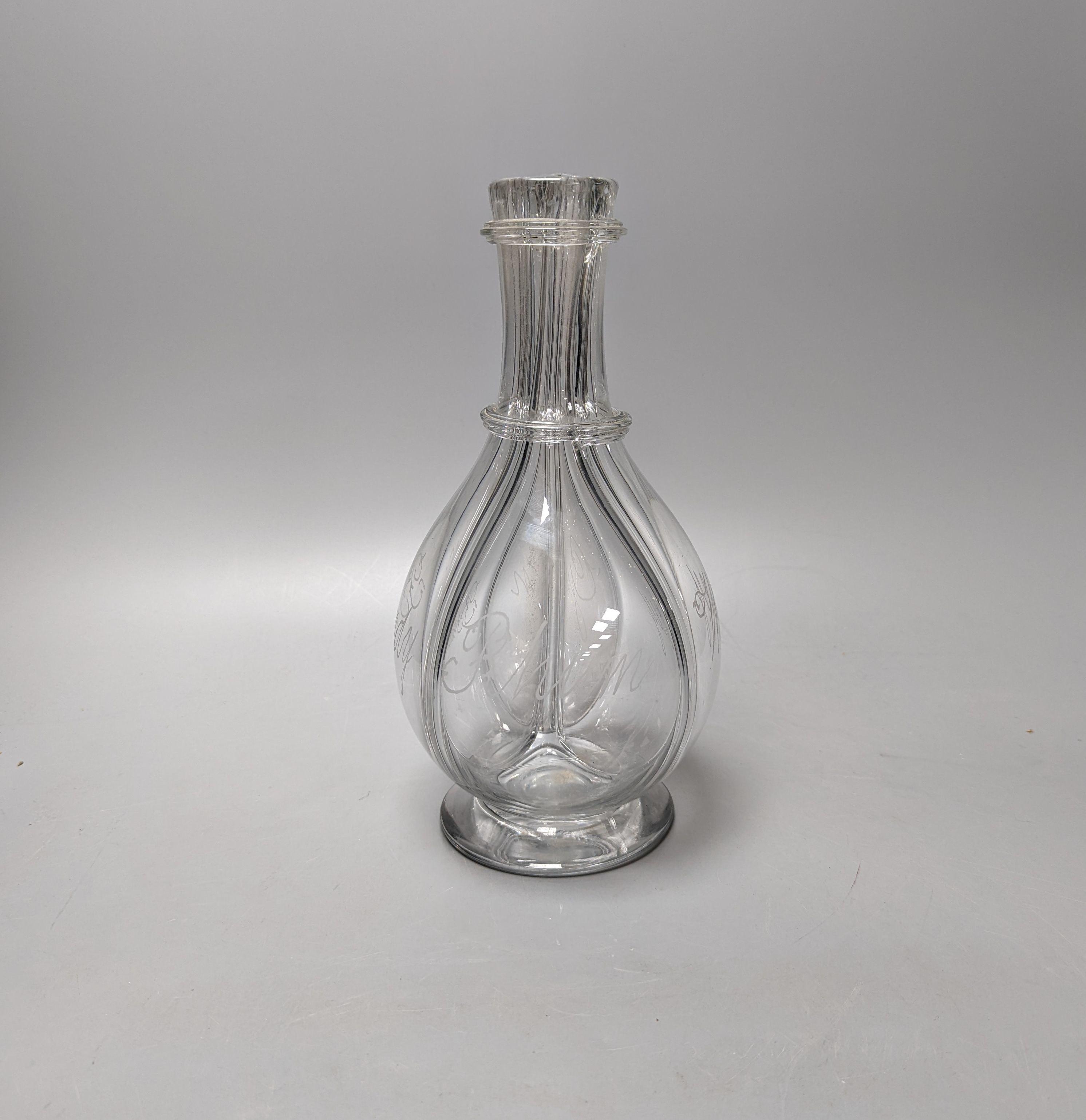 A Dutch? glass four compartmented spirit bottle, engraved with Rhum, Wiskey, Gin and Brandy 26cm